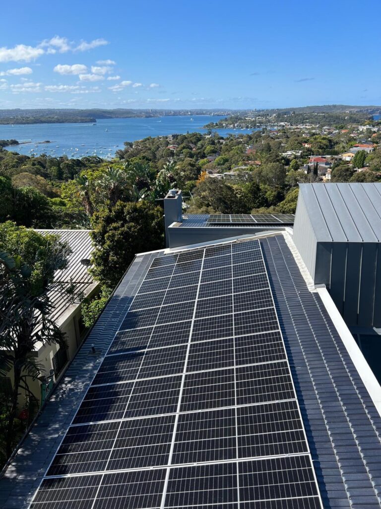 Rooftop solar install with harbour views