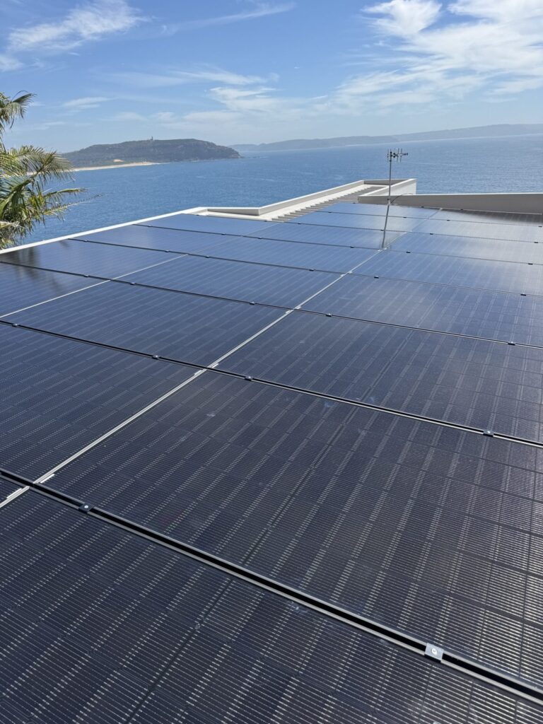 All-black rooftop solar overlooking the ocean, Northern Beaches